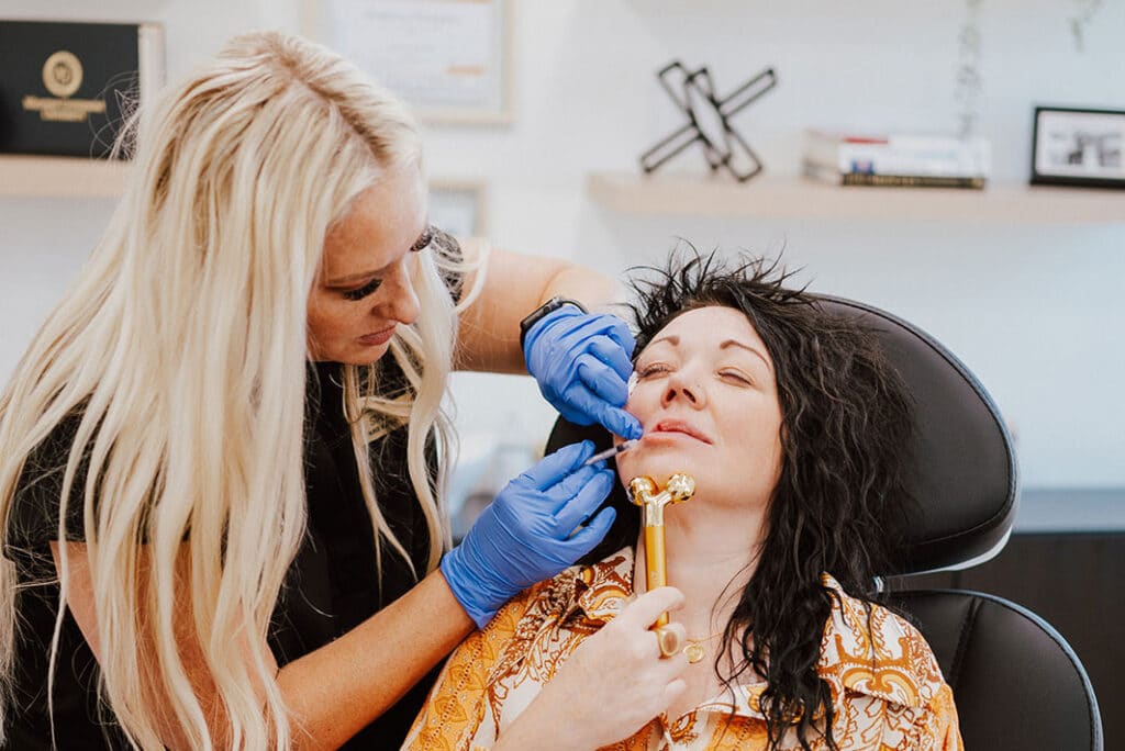 Aesthetic Injector Stacie Colby Injecting Client